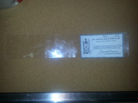 Position your card along the top edge of the tape and press down. 